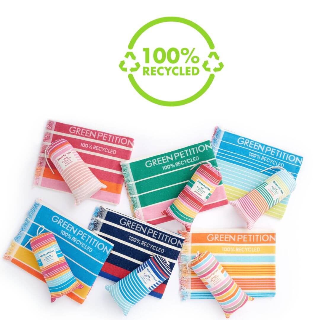 A collection of colorful products labeled '100% RECYCLED' showcasing eco-friendly materials and sustainable practices.