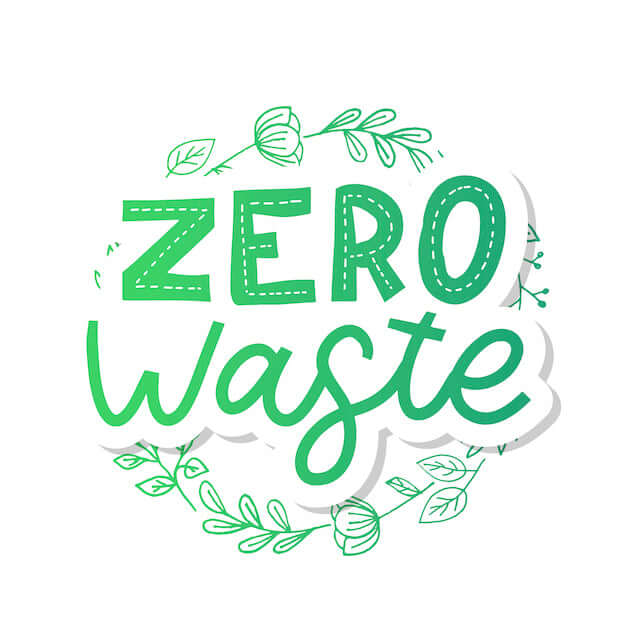 Green zero waste logo featuring decorative leaves and a nature-friendly design.