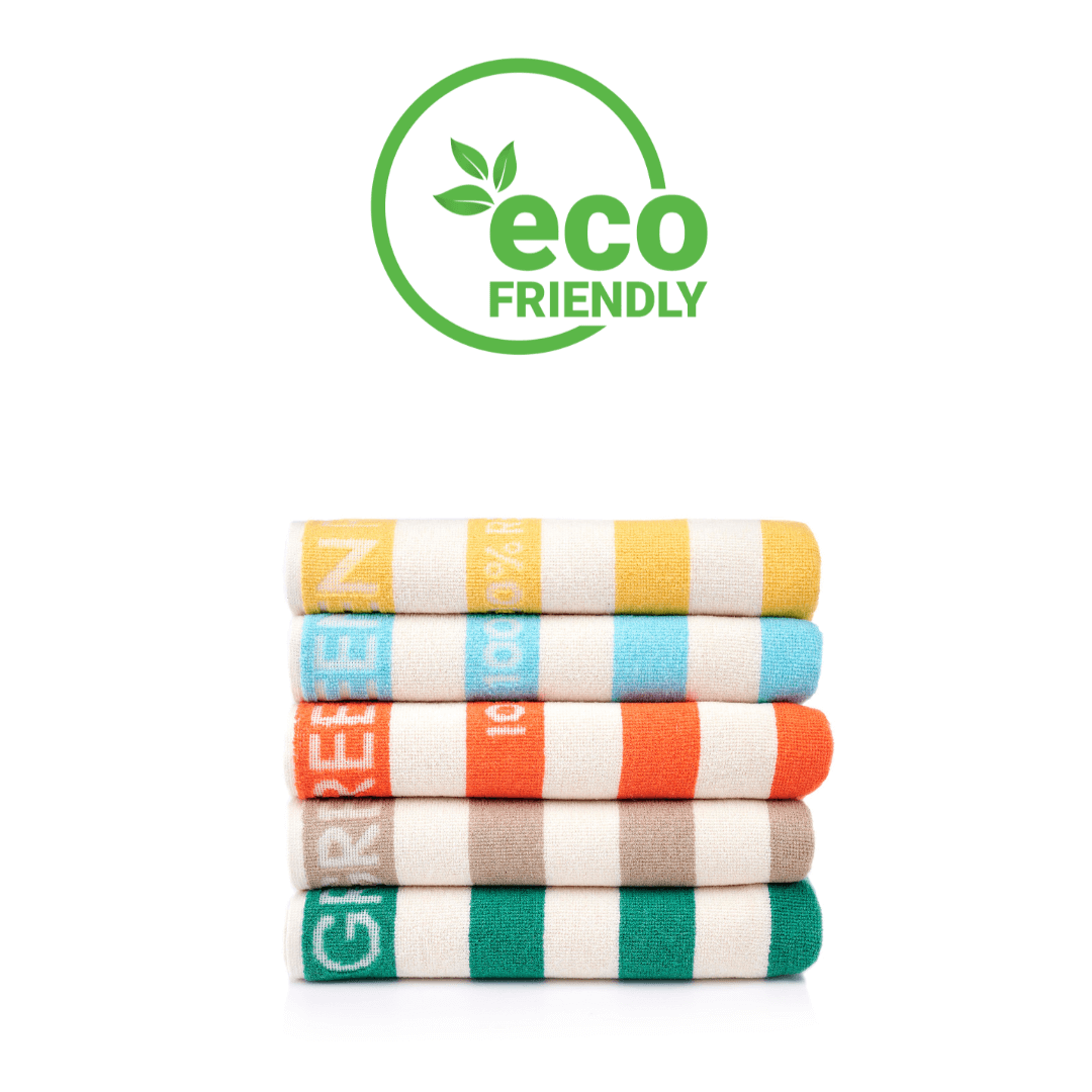 Colorful eco-friendly towels stacked with a green eco-friendly symbol above.
