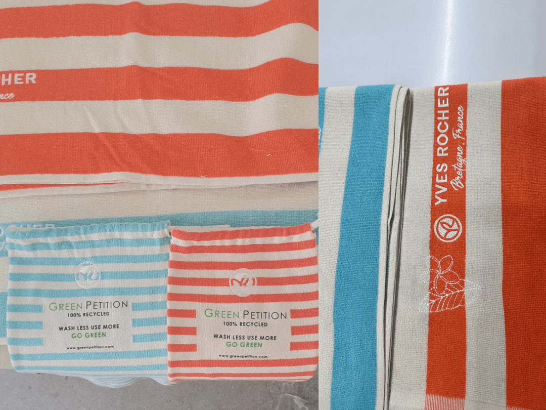 Eco-friendly recycled towels in striped patterns, featuring Green Petition and Yves Rocher branding.
