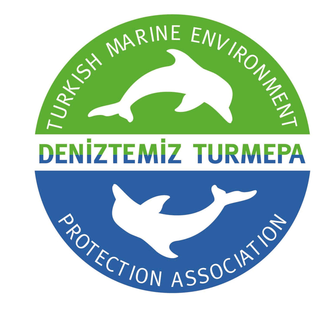 Logo of the Turkish Marine Environment Protection Association, featuring dolphins and promoting marine conservation efforts.