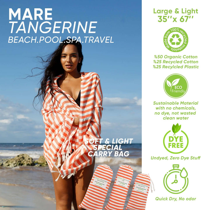 Mare Tangerine Peshtemal towel in striped design on beach, made from organic cotton and recycled materials.