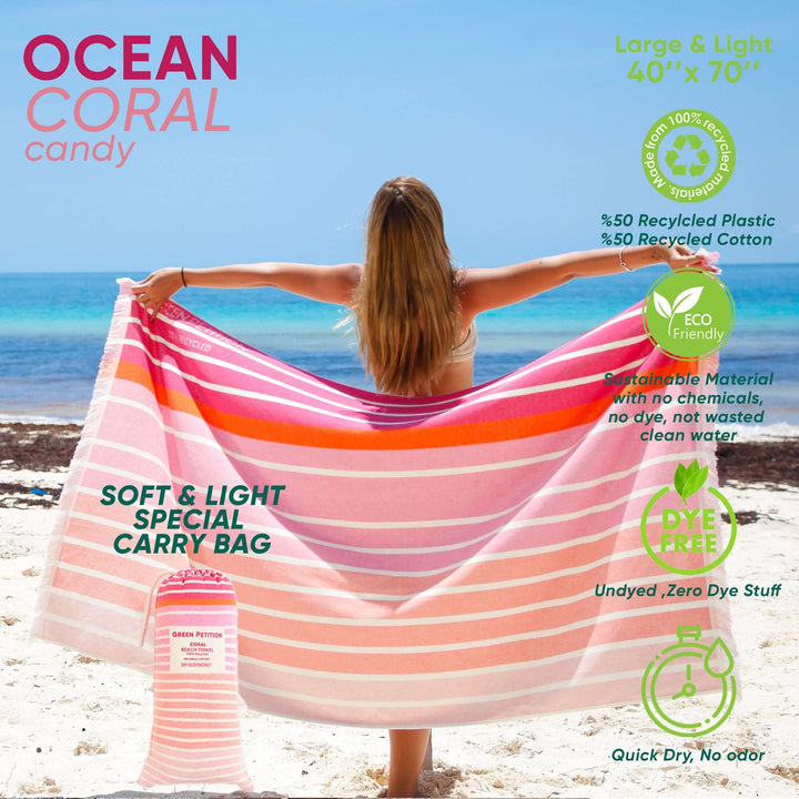 Ocean Coral Candy Beach Towel on the beach, eco-friendly, made from recycled materials, lightweight and portable.