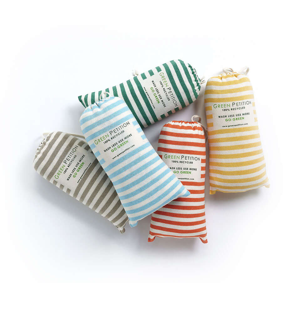 Colorful striped fabric sachets from Green Petition, featuring various shades for home decor and fragrance.