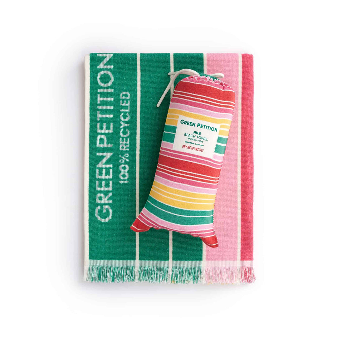 Ocean Nile Moss Beach towel with carrying bag, made from 100% recycled materials, showcasing vibrant colors.