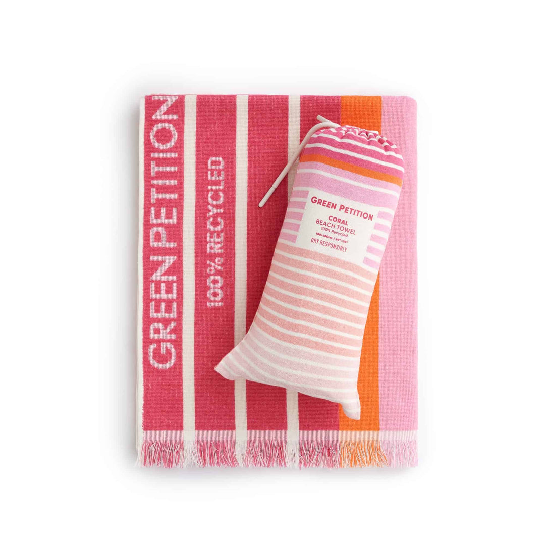 Eco-friendly Ocean Coral Candy beach towel with compact carrying bag, made from 100% recycled materials.