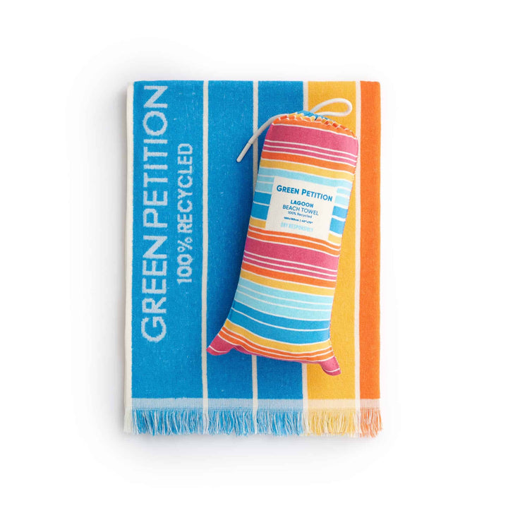 Ocean Lagoon Aqua Beach Towel in blue and orange stripes with matching carrying bag, eco-friendly and stylish.