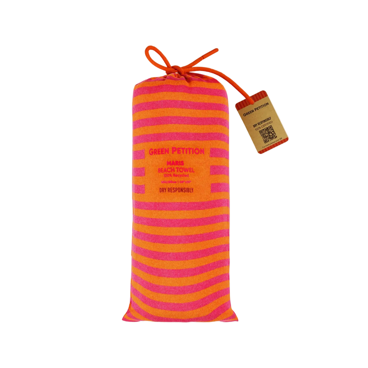 Striped beach towel with 'Green Petition' branding on a white background