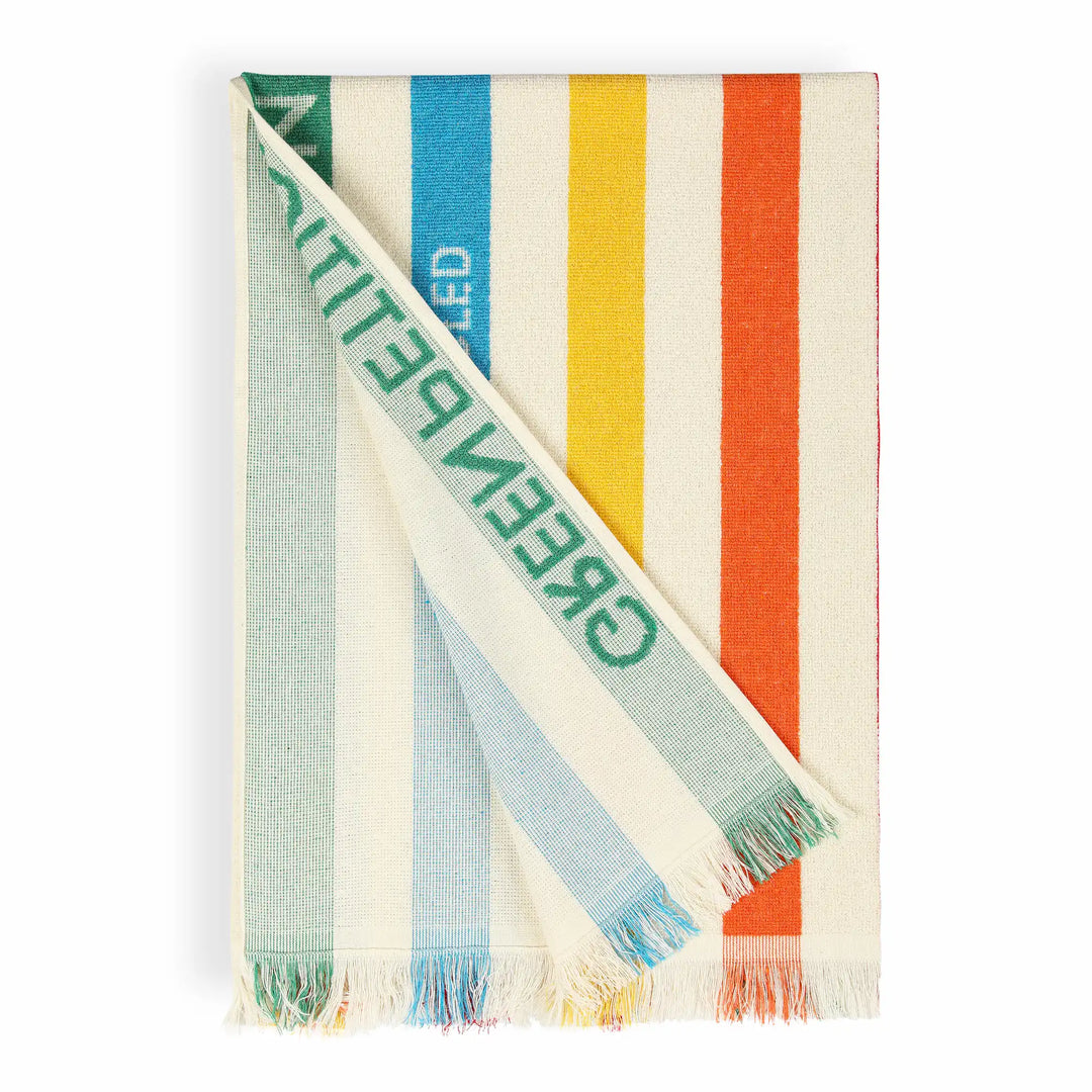 Colorful striped scarf with text on a white background